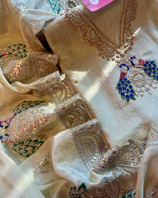 Ivory peacock shimmer silk suit set with pita and dori work