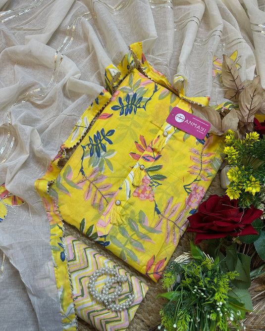 Yellow leafy print cambric cotton suit with gotta patched dupatta