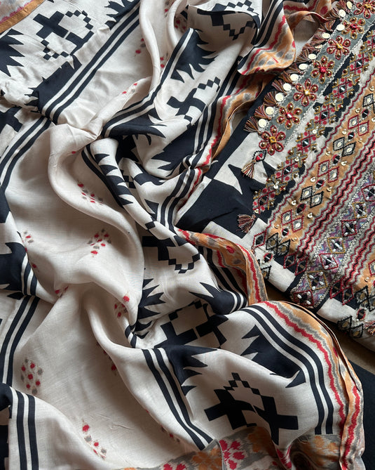 Ikkat print muslin suit set with coin work neck