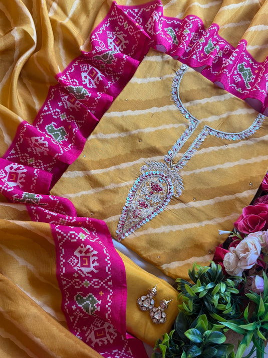 Lehria Patola mustard raw silk suit set