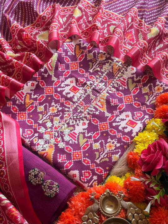 Semi Tussar pita neck patola print suit set