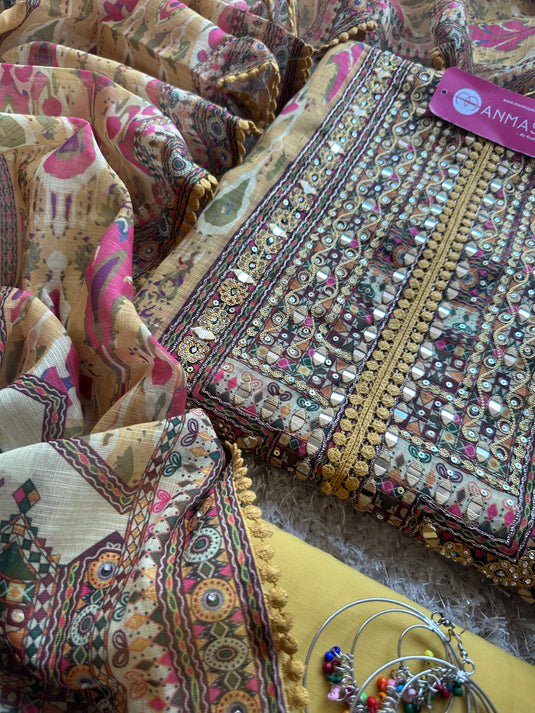 Printed linen Chanderi suits with highlighted thread and mirror details