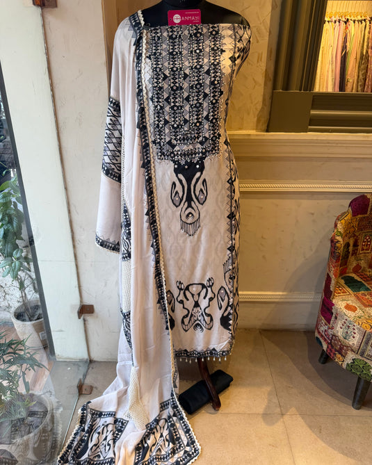 Pakistani Muslin highlighted semi stitched suit set