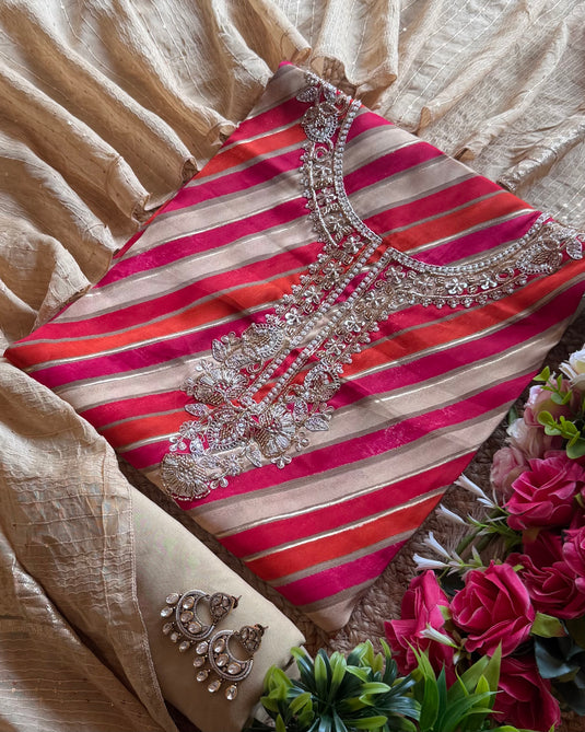 Modal coloured lehria embroidered neck suit with golden stole