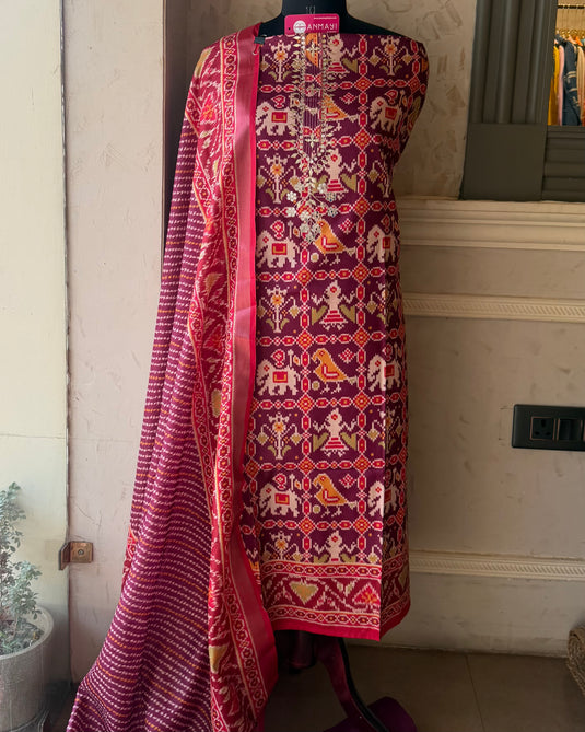 Semi Tussar pita neck patola print suit set