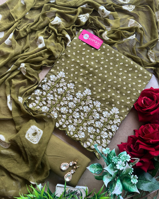 Batik print cambric cotton suit with aari work border and batik semi chiffon dupatta