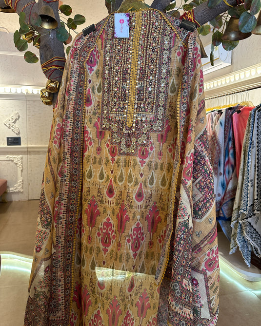 Printed linen Chanderi suits with highlighted thread and mirror details