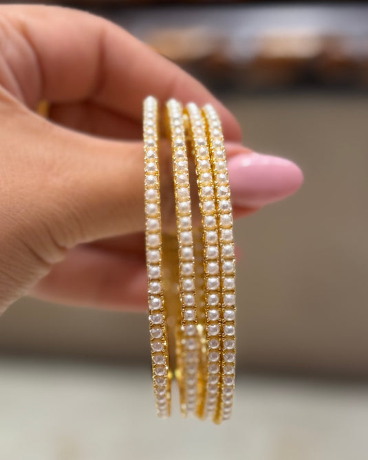 Sleek pearl bangles (set of 4)