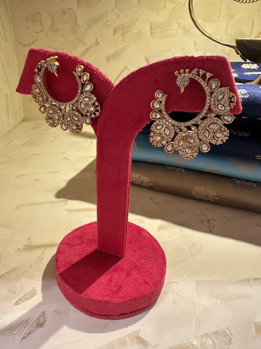Peacock feather twirl earrings