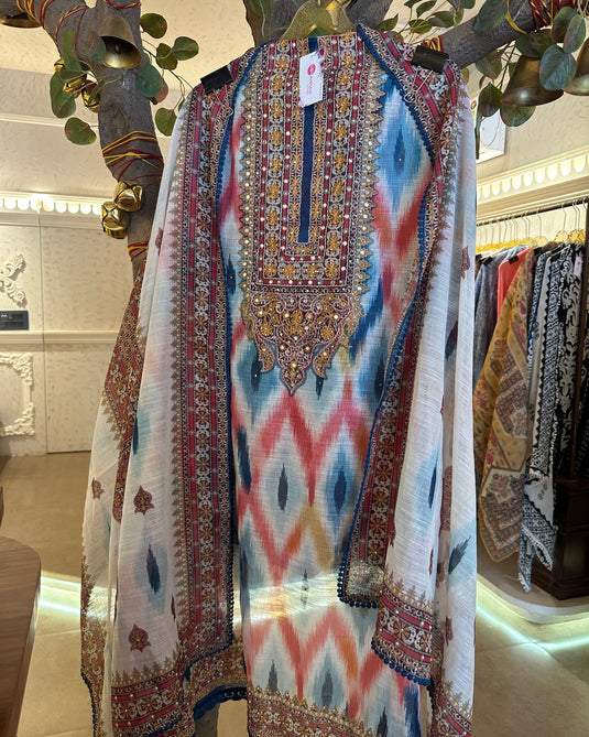 Printed linen Chanderi suits with highlighted thread and mirror details