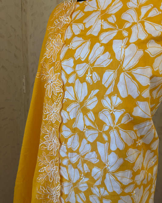Bright yellow pure cotton suit with cutowork embroidered dupatta and ends