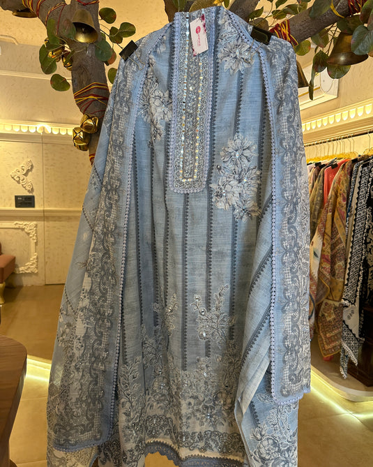 Printed linen Chanderi suits with highlighted thread and mirror details