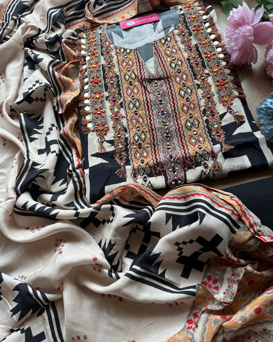 Ikkat print muslin suit set with coin work neck