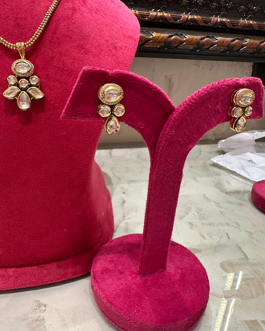 Triveni Kundan pendant set with tops