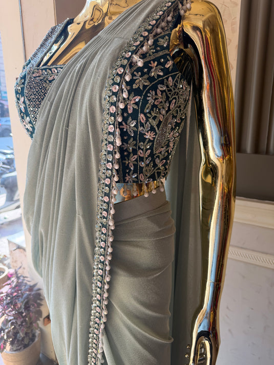 Kridha sage green drape saree with embellished ready to wear blouse