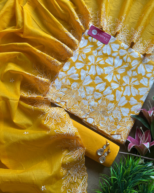 Bright yellow pure cotton suit with cutowork embroidered dupatta and ends