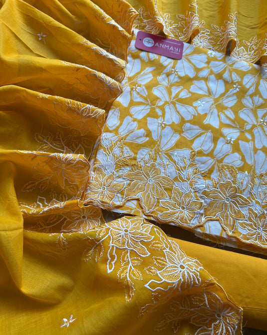 Bright yellow pure cotton suit with cutowork embroidered dupatta and ends