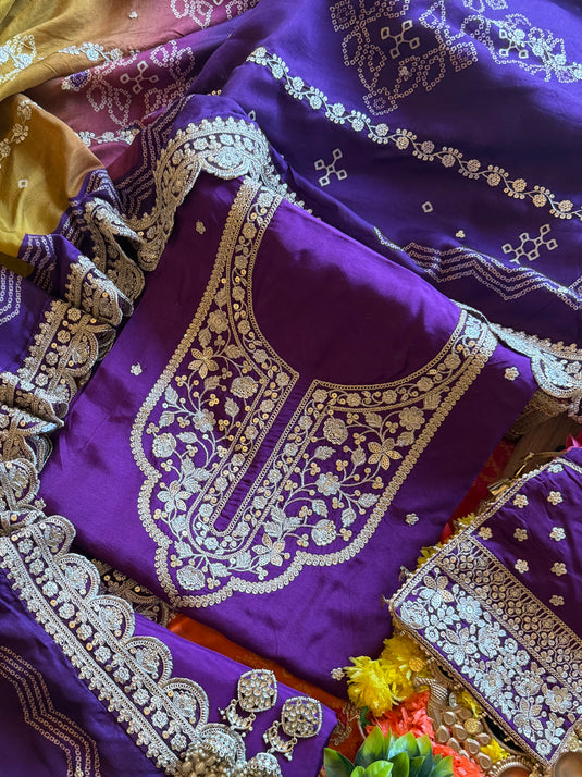 Dori neck pure Dolla silk suit set with Dori work Bandhani print dupatta and potli
