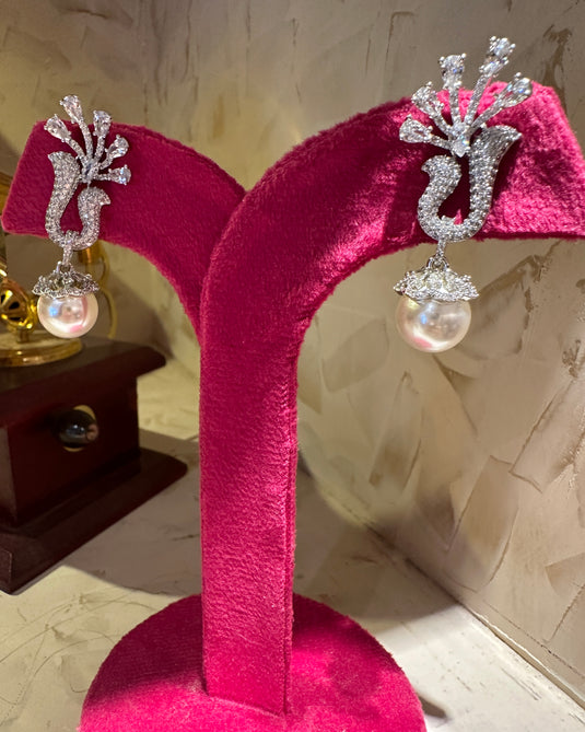 Hanging pearl swan earrings