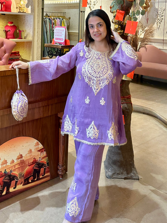 Pita work organza shimmer coord set with fringe lace details and potli