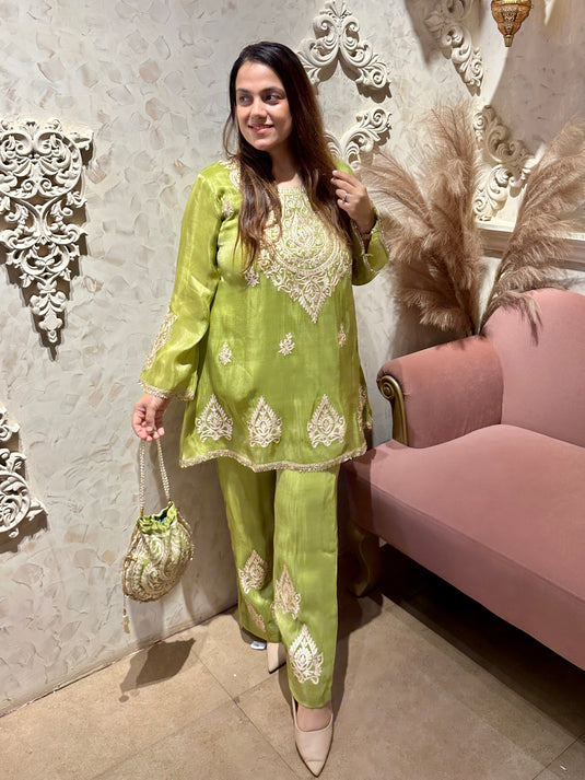 Pita work organza shimmer coord set with fringe lace details and potli