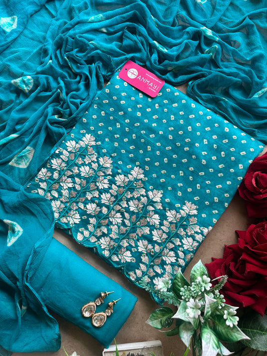 Batik print cambric cotton suit with aari work border and batik semi chiffon dupatta