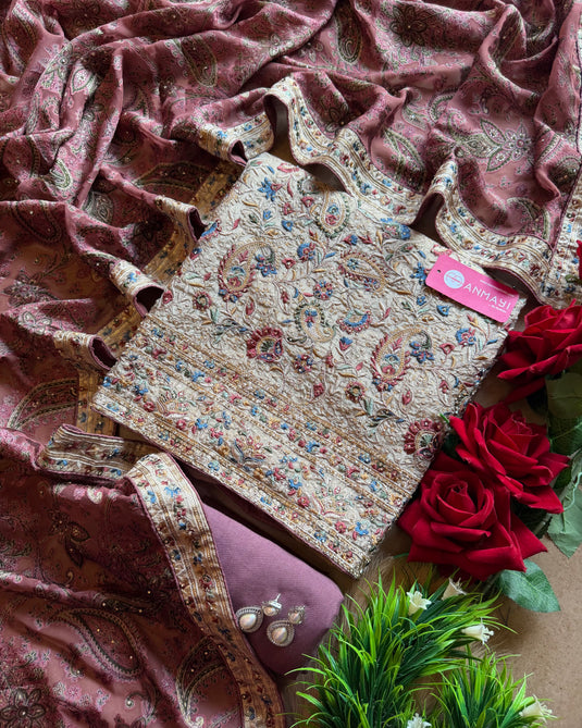 Gold tissue suit set with parsi embroidery and braso effect dupatta
