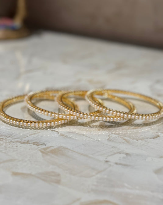 Sleek pearl bangles (set of 4)