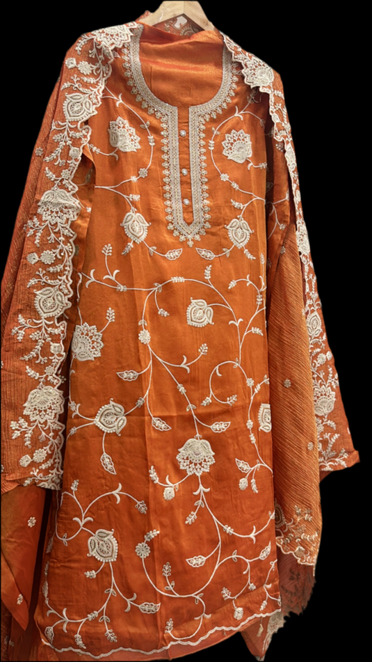 Pure tissue rusty orange suit with aari work and crushed dupatta