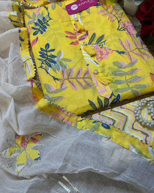 Yellow leafy print cambric cotton suit with gotta patched dupatta