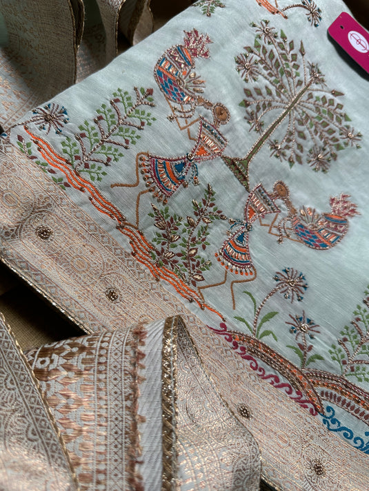 Pure silk with intricate jacquard work in warli pattern