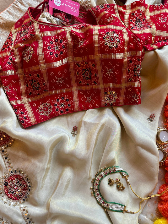 Shimmer ivory mirror work saree with red gharchola embroidered blouse