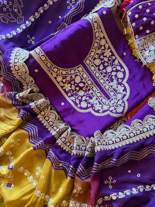 Dori neck pure Dolla silk suit set with Dori work Bandhani print dupatta and potli
