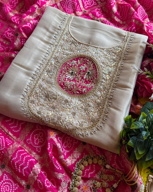 Shimmer organza zardosi neck work paired with Bandhani Khaddi Dupatta