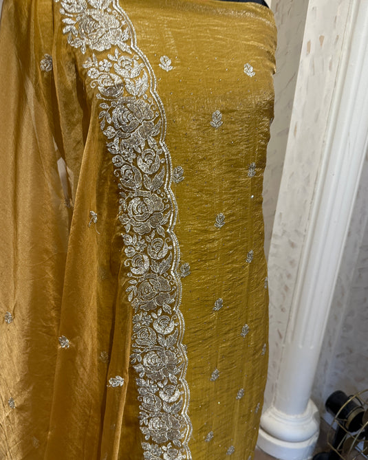 Crushed shimmer silk suit set with intricate dori work and organza dupatta