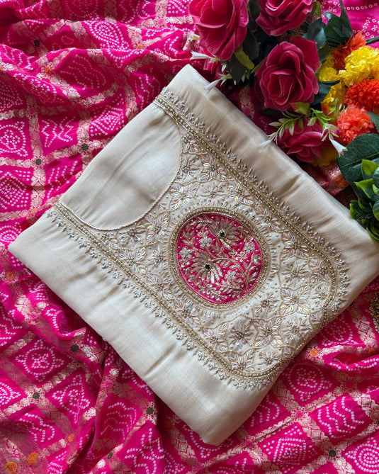 Shimmer organza zardosi neck work paired with Bandhani Khaddi Dupatta