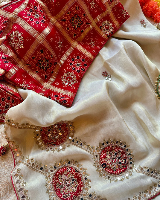 Shimmer ivory mirror work saree with red gharchola embroidered blouse