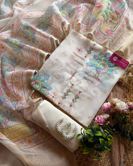 Peacock highlights Kota Banarasi ivory suit set