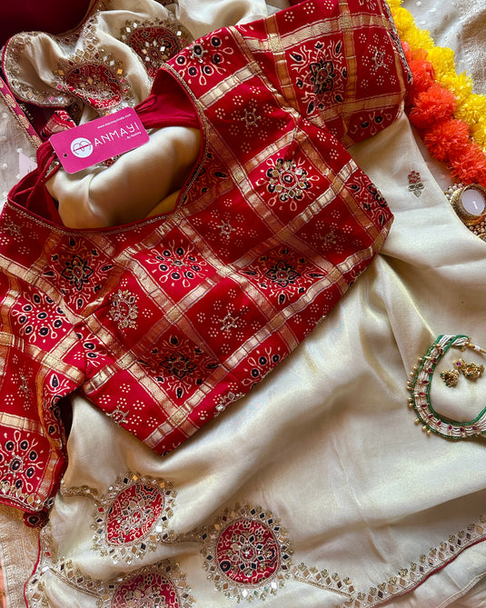 Shimmer ivory mirror work saree with red gharchola embroidered blouse