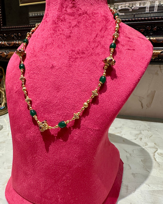 South Indian pearl string with ruby and emeralds