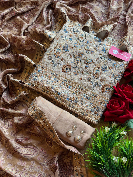Gold tissue suit set with parsi embroidery and braso effect dupatta