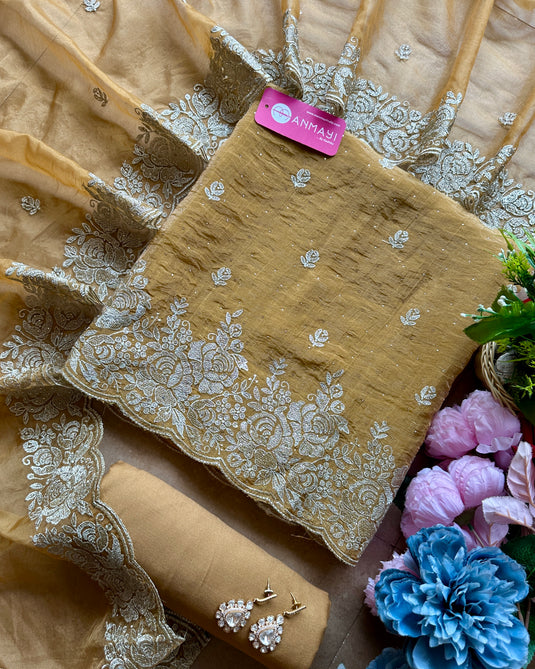 Crushed shimmer silk suit set with intricate dori work and organza dupatta