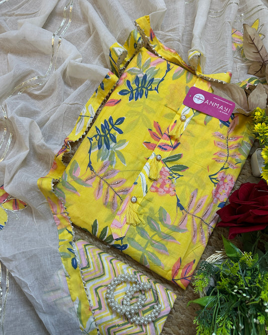 Yellow leafy print cambric cotton suit with gotta patched dupatta