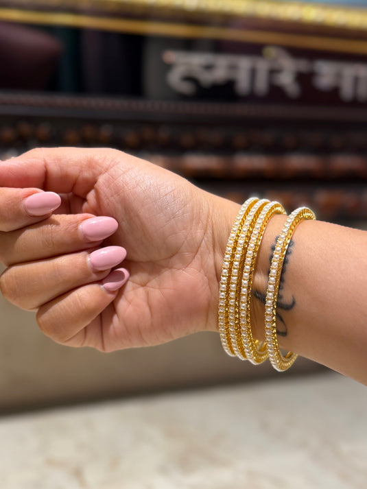 Sleek pearl bangles (set of 4)