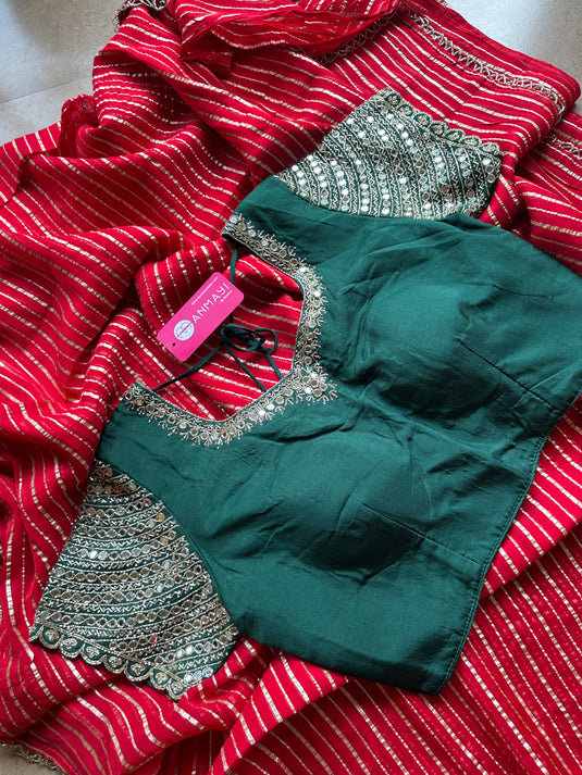 Zari weave red chiffon saree with bottle green mirror work padded blouse