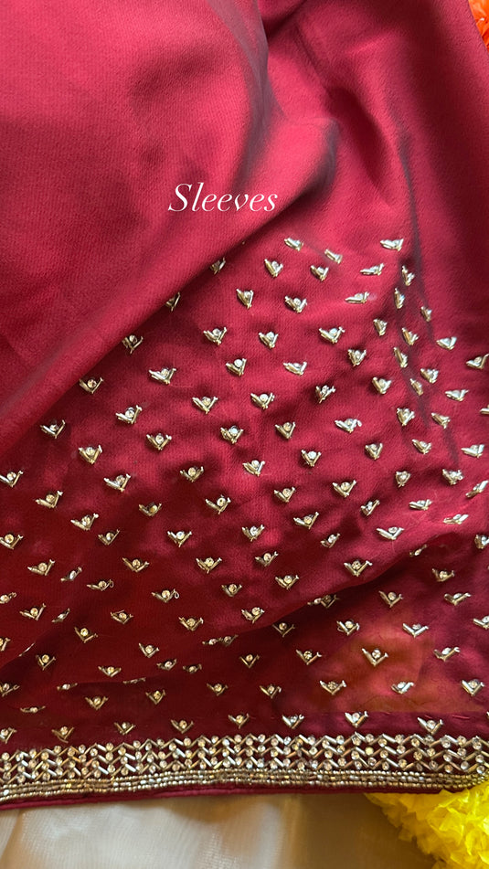 Stone border chinnon plain saree with hand embroidered blouse