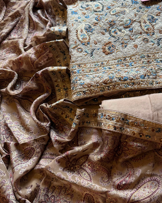 Gold tissue suit set with parsi embroidery and braso effect dupatta