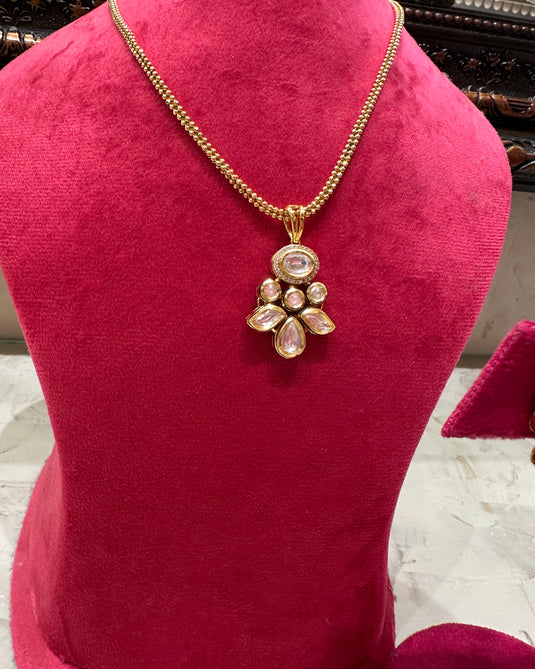 Triveni Kundan pendant set with tops