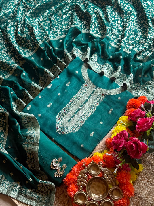 Pure Dolla silk zari work suit with coloured Kundan neck