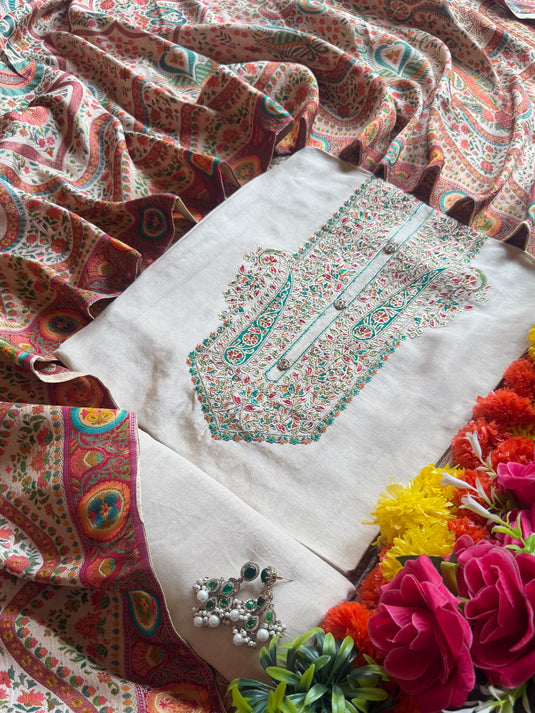 Silk ivory position print suit set with Kani weave dupatta
